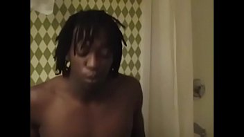 Sexy black twink gives his dick in shower room